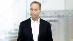 James Carpentier instructor image wearing a suite and white shirt
